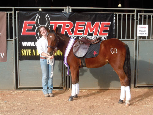 Carolyn Lynch and her yearling Mustang Bullseye